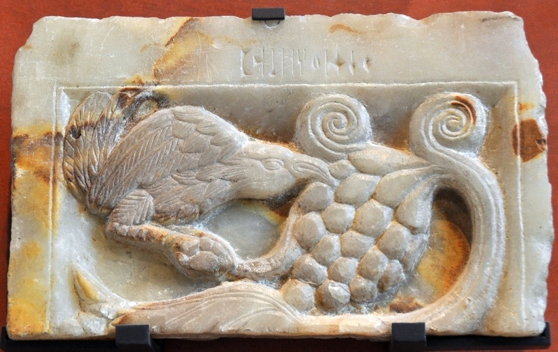 Yemen, Relief of a bird eating grapes