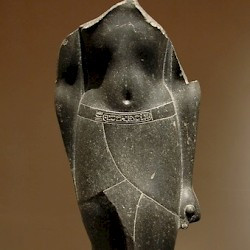 Statue of a king named Ptolemy; the cartouche mentions his surname "Neos Dionysos", allowing identification with Ptolemy XII Auletes and Ptolemy XV Caesarion