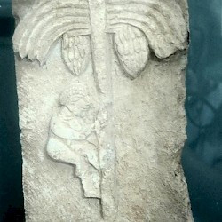 Bani Walid, Relief of a  man climbing a palm tree