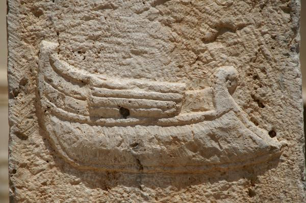 Lepcis Magna, Macellum, miniature arch, relief of a freighter