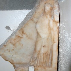 Taucheira, Marble relief of a woman