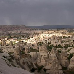 A valley in Cappadocia with some rock houses