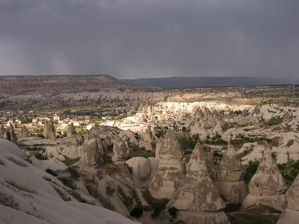 A valley in Cappadocia with some rock houses