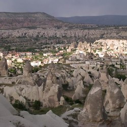 A valley in Cappadocia with some rock houses