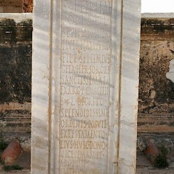 Lepcis Magna, Plaza, inscription of Septimia Polla