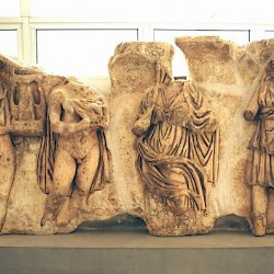 Lepcis, Arch of Septimius Severus, inside, Twelve Olympian gods, upper register