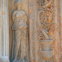Lepcis, Arch of Septimius Severus, SW, barbarian (right)