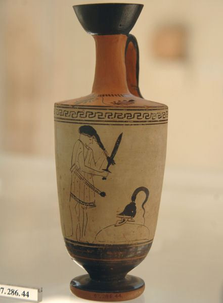 Warrior cutting his hair with his sword; Athenian lekythos