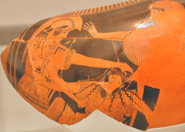 Orestes kills Aegisthus; Clytaemnestra to the left.