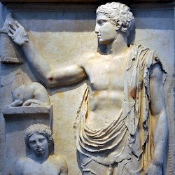 Aegina, Tombstone of a young man, holding a bird