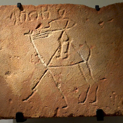 Dedan, Temple, Relief of a priest on a dromedary and a Dedanite inscription