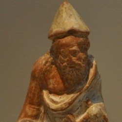 Pella, Figurine of a paidagogos