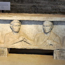 Rome, Via Appia, Relief of four men