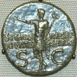 Germanicus returns with the recovered legionary standard (coin by his son Caligula)