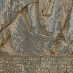 Behistun, Darius' relief, Gaumata being trampled upon by Darius