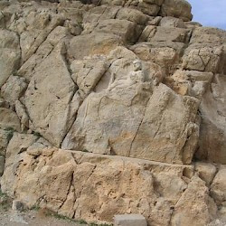 Behistun, Statue of a reclining Heracles from a distance