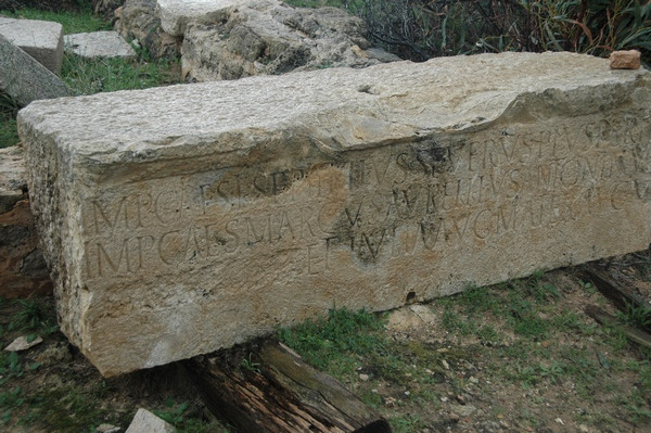 Lepcis, Amphitheater, inscription of Septimius Severus, Caracalla and (erased) Geta