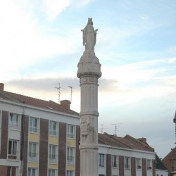 A modern monument indicating the eight roads beginning in Bavay. The statue represents Brunhilda.