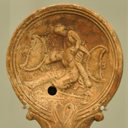 Roman oil lamp with an Amazonomachy