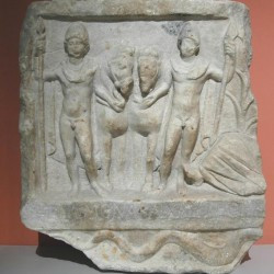 Amphipolis, Relief of the Dioscuri and the river god Strymon (to the right; only his legs are visible)