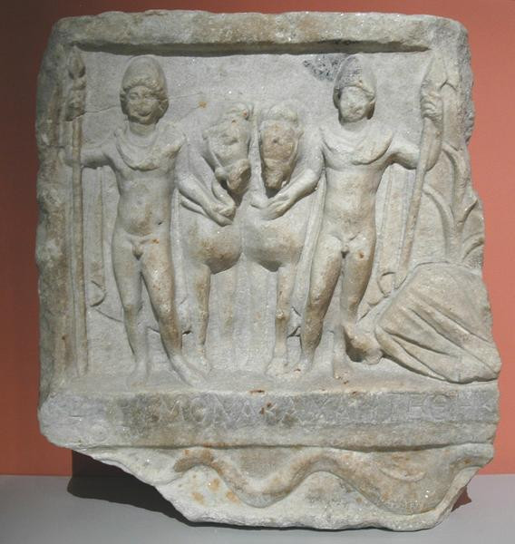 Amphipolis, Relief of the Dioscuri and the river god Strymon (to the right; only his legs are visible)