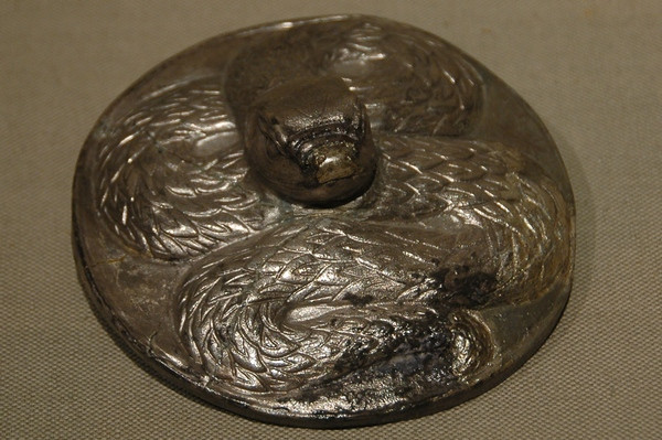 Plate, decorated with a snake (Early Bronze Age)