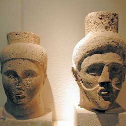 Lepcis Magna, Heads of two Punic magistrates