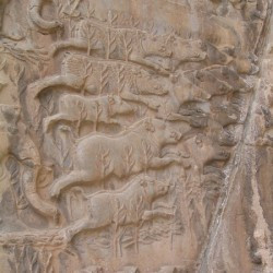 Taq-e Bostan, Large cave, Hunting scene: Boars