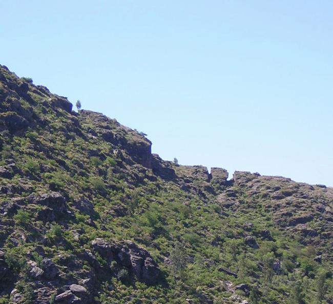Barikot, Ditches on the western slope, seen from the north.