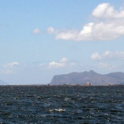 The Aegates Islands: Favignana (ancient Aegusa) to the right and  Maréttimo (Hiera Nesos) to the left in the distance.