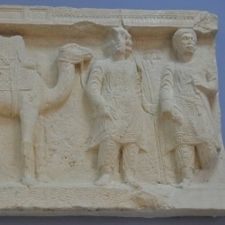 Palmyra, Diocletianic Camp, Relief of a dromedary, a merchant, and a soldier