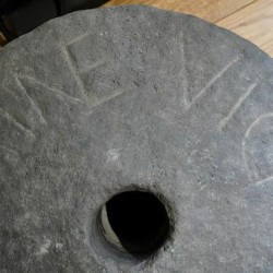 Rindern, Millstone with inscription FINES VICI ("town limits")